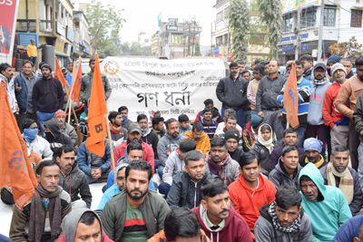 Tripura Auto Rickshaw Mazdoor Sangha organised a sit-in protest at Agartala on December 29 demanding legal action against Bajaj Auto for selling auto-rickshaws without route permits.